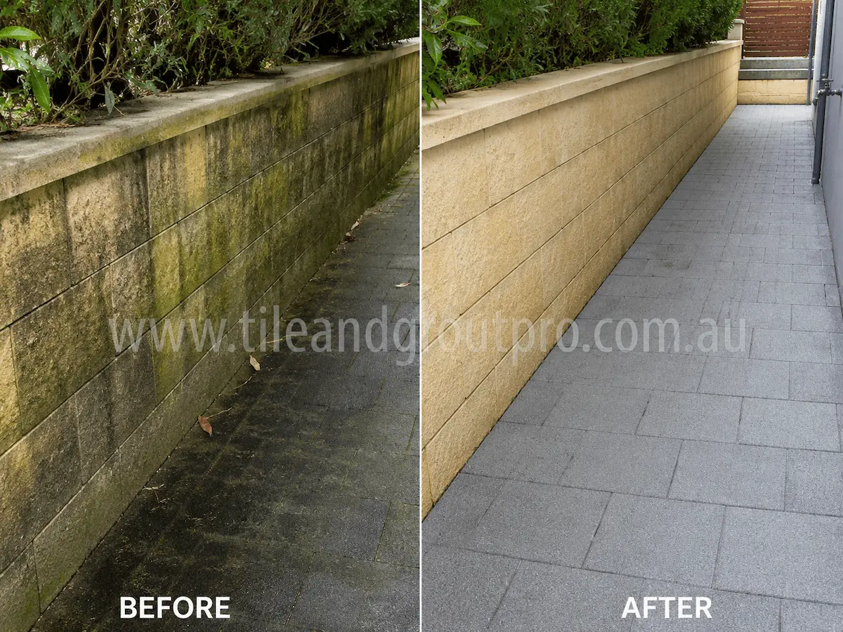 Before and after view of outdoor stone retaining wall and paver pathway with moss, algae, and dark grime buildup cleaned using high-pressure cleaning.