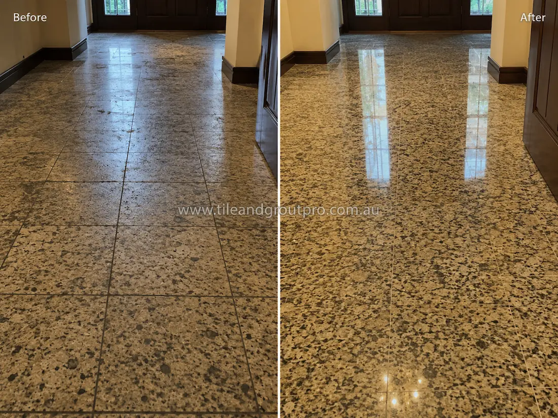 Before tile renewal, the terrazzo entryway floor tiles appeared dull and worn with reduced shine and visible surface traffic marks in a residential foyer.