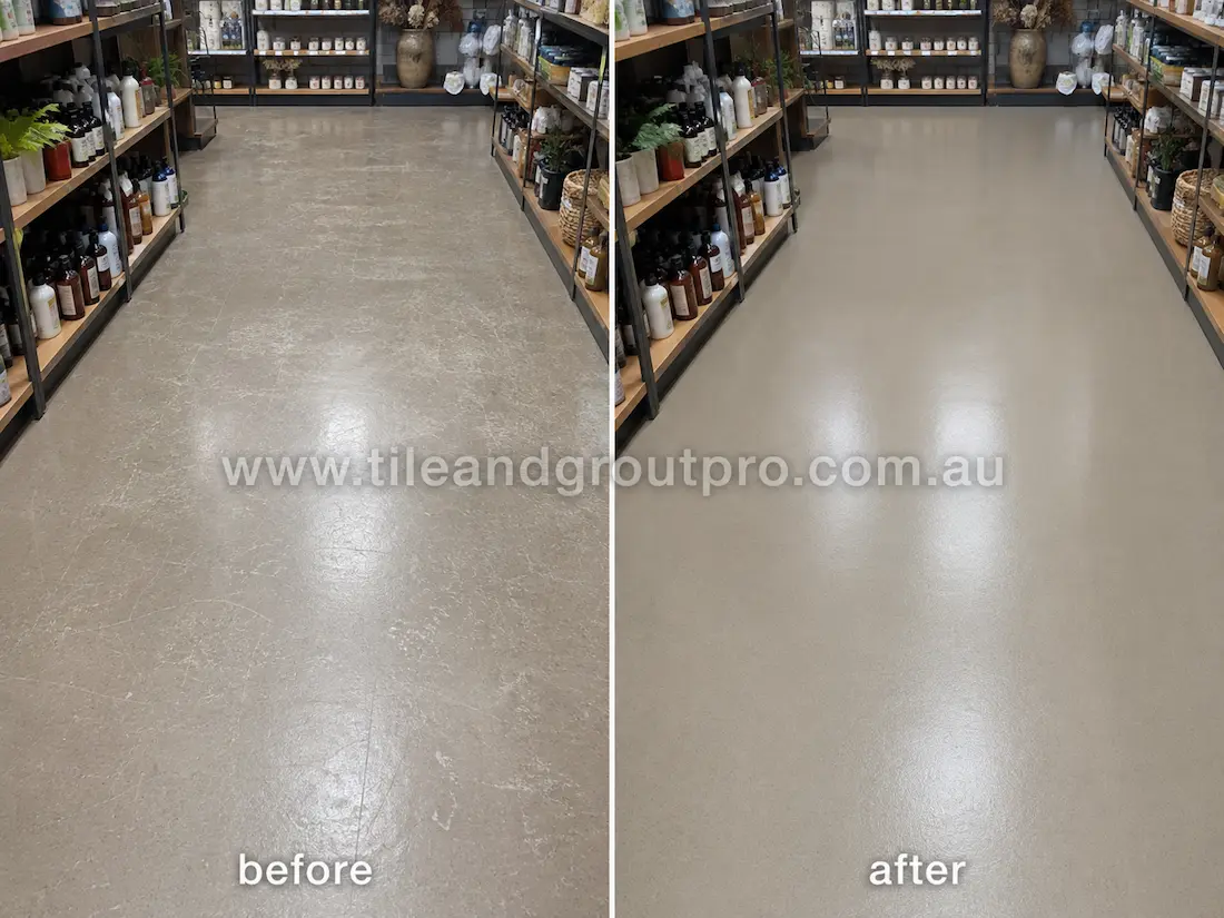 Retail store aisle with grey linoleum floors before sealer stripping, displaying cloudy residue, scuffs, scratches, and worn protective coating between product shelving units.