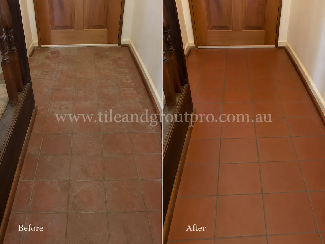 Indoor entryway with quarry floor tiles displaying cloudy sealer residue, dull appearance, and worn traffic marks before Sealer Stripping restoration.