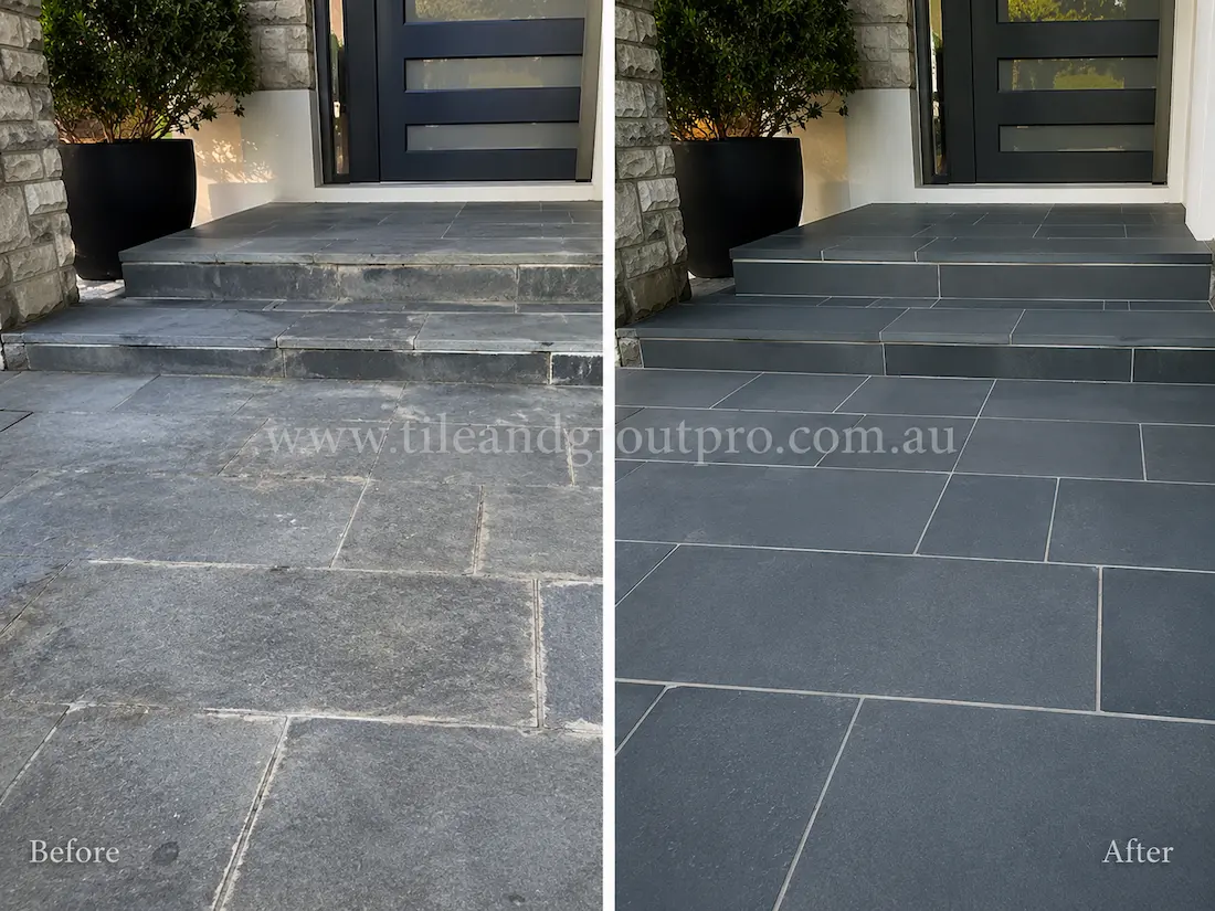 Residential front entrance with bluestone steps and landing showing discoloration, wear, and weathered stone surfaces before professional bluestone tile resurfacing.