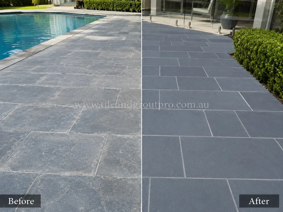 Outdoor poolside bluestone patio with faded pavers and weather-related surface dullness before professional bluestone tile resurfacing and sealing.
