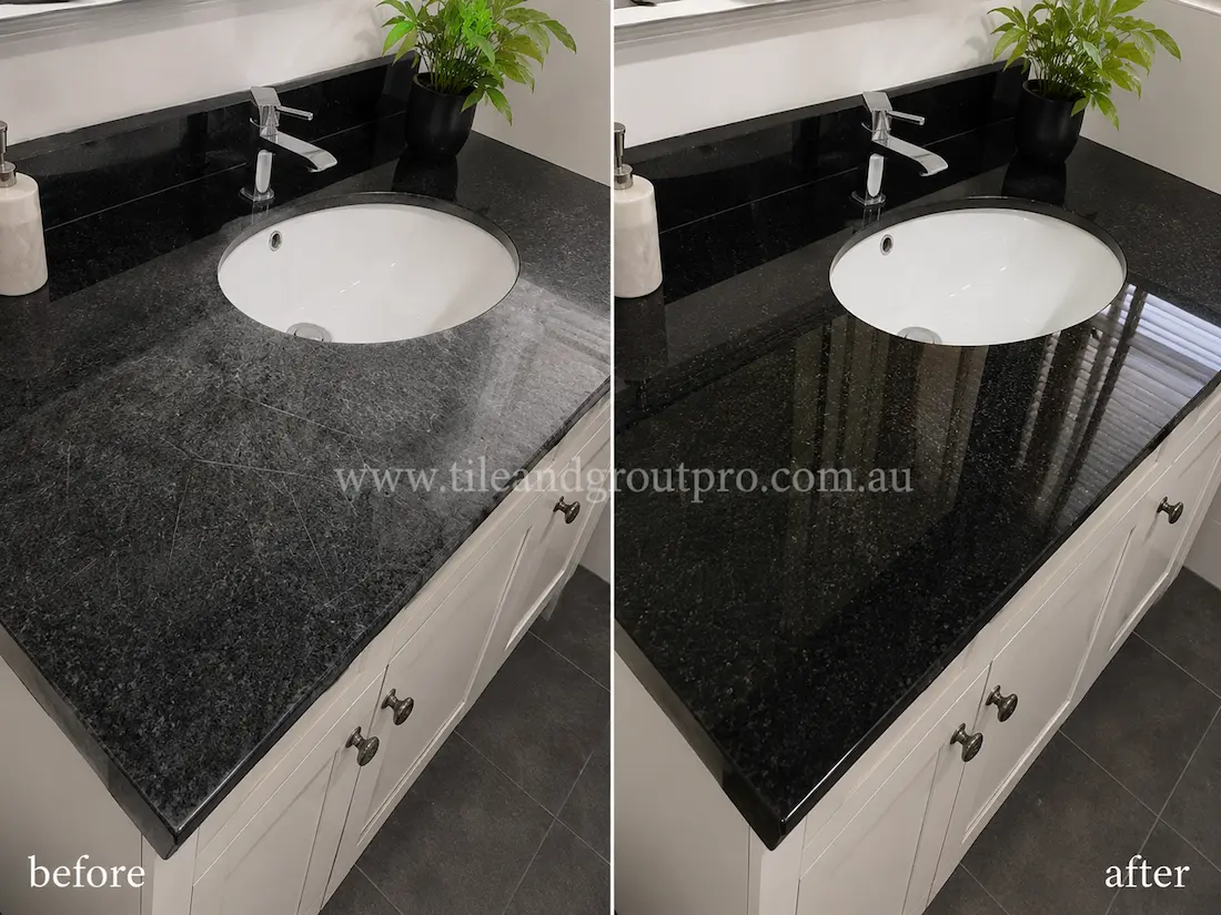 Bathroom vanity with black granite countertop before and after scratch removal, showing dull scratched stone around the sink restored to a deep glossy polished finish.
