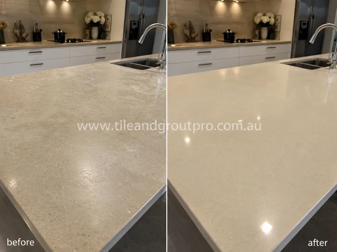Modern kitchen limestone benchtop before grinding, showing dull stone finish, light etching, surface wear, and reduced shine around the sink and food preparation area.