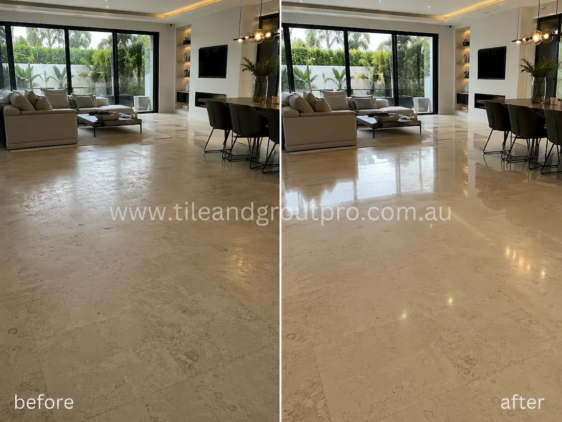 Open-plan living room limestone floor before grinding, showing dull patches, light scratches, worn polish, and reduced shine across the dining and lounge area.