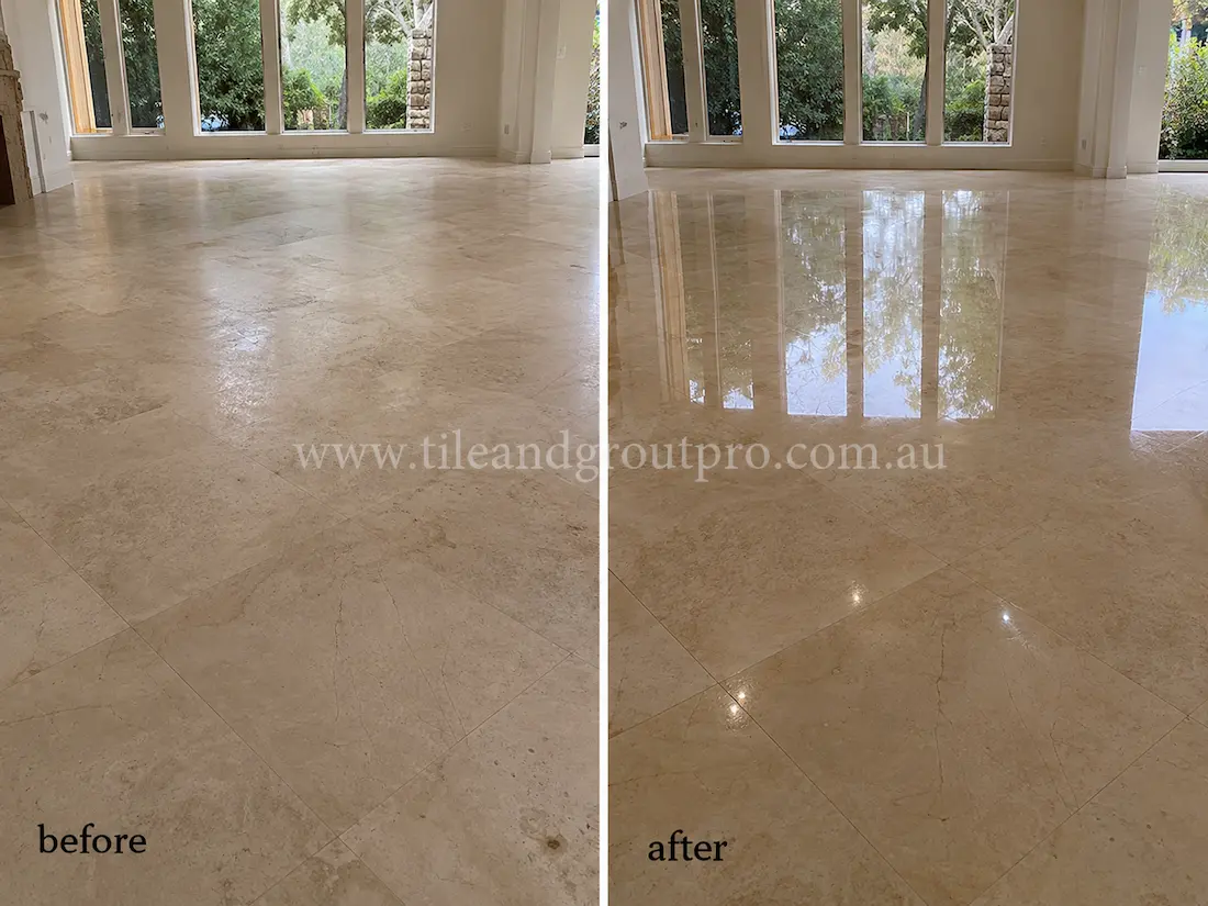 Large beige marble living room floor with dull surface and visible wear before residential stone polishing service.
