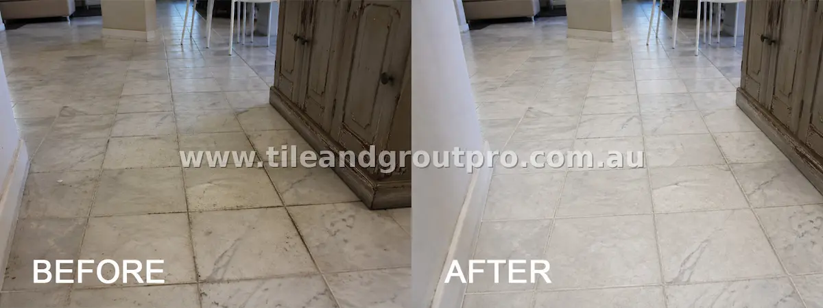 Marble dining area floor tiles with tracked-in dirt, smudges, and darkened grout lines before tile and grout cleaning