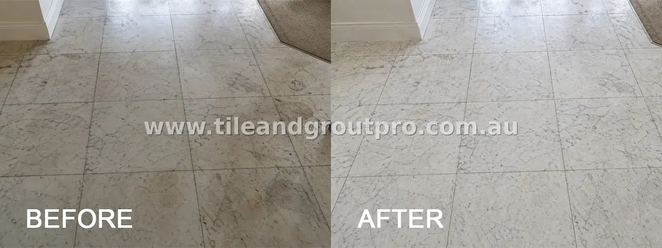 Marble hallway floor tiles showing stains, foot traffic marks, and worn grout lines before tile and grout cleaning