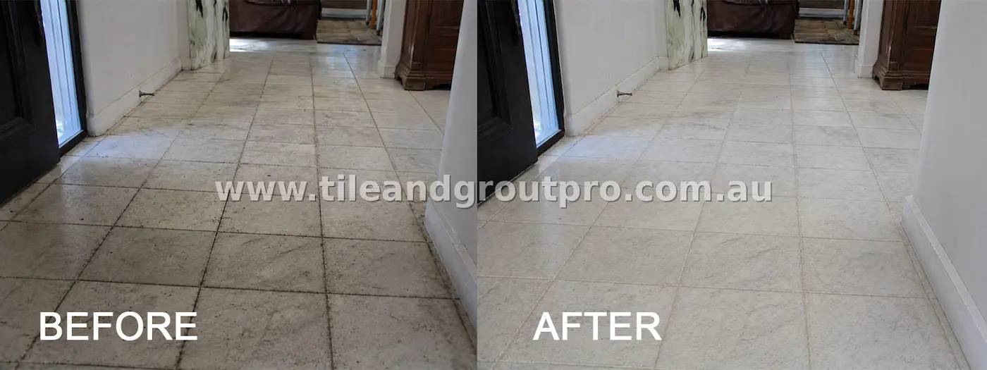 Indoor marble hallway floor tiles with visible grime, dull finish, and dark grout lines from foot traffic before cleaning