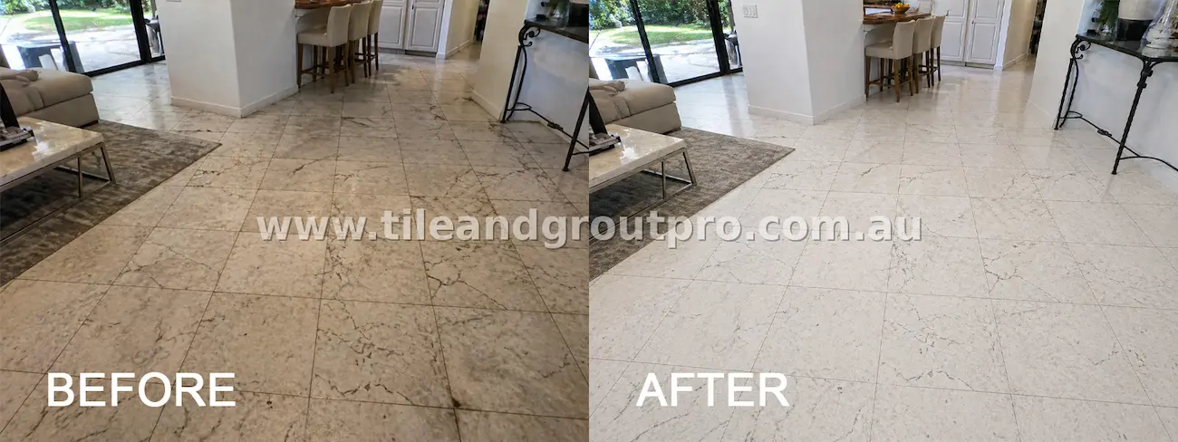 Indoor marble tile flooring with patchy dirt buildup, uneven coloration, and visible grout staining before cleaning