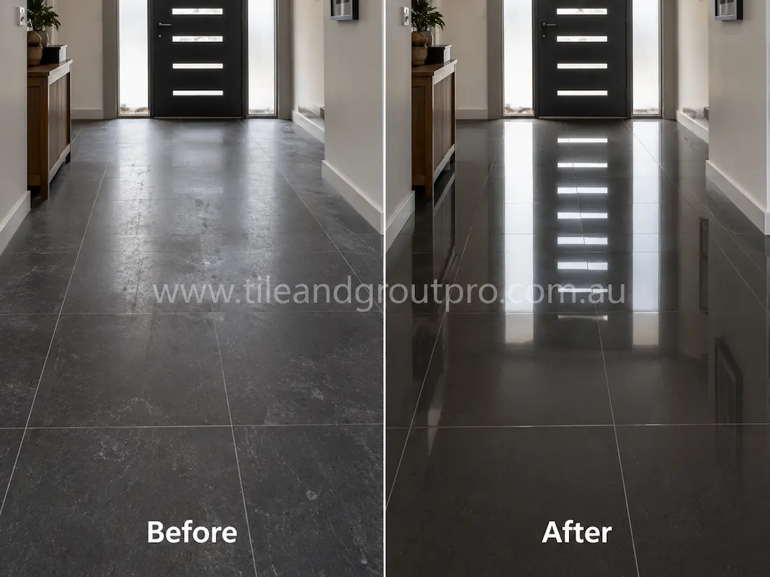 Before stone-polishing, black porcelain entryway floor tiles showed haze, scuff marks, and uneven shine in a residential hallway entrance.