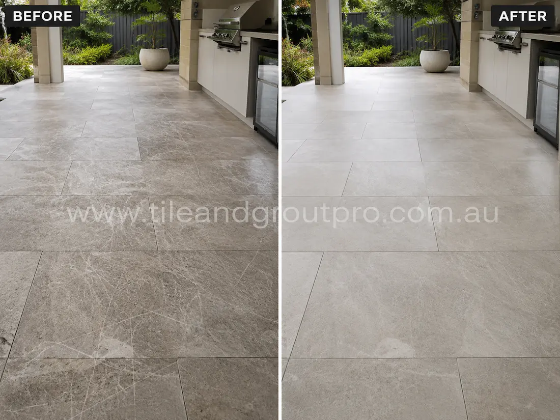 Outdoor covered patio with light grey porcelain tiles showing scratches, abrasion marks, and worn surface finish before professional scratch removal.