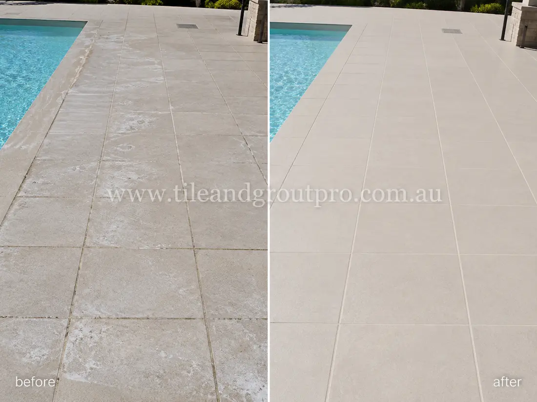 Poolside patio with large-format porcelain floor tiles before sealer stripping, showing mineral residue, cloudy sealer build-up, and faded surface appearance beside the swimming pool.