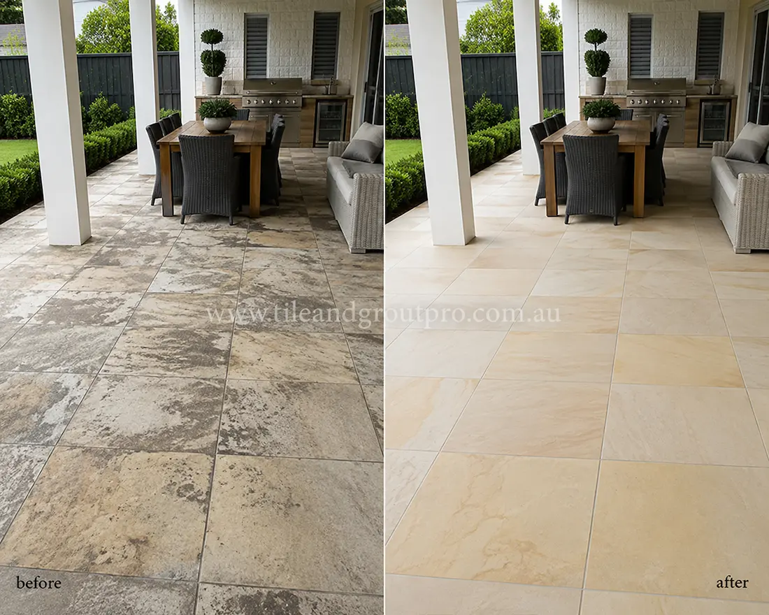 Covered outdoor entertaining area with sandstone floor tiles showing dirt buildup, staining, and worn appearance before sandstone tile resurfacing and sealing.