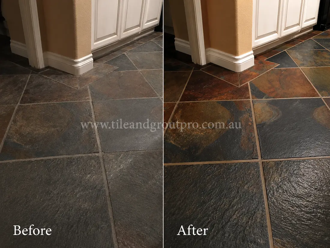 Before stone polishing, interior slate floor tiles beside cabinetry appeared worn and flat, with muted charcoal and rust tones, light surface residue, and a lack of depth in the natural stone texture.
