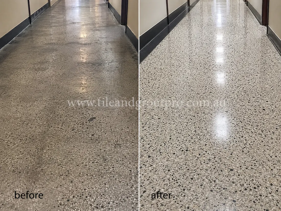 Commercial lobby terrazzo floor with visible scratches, surface haze, and worn finish before professional terrazzo tile resurfacing and high-gloss restoration.