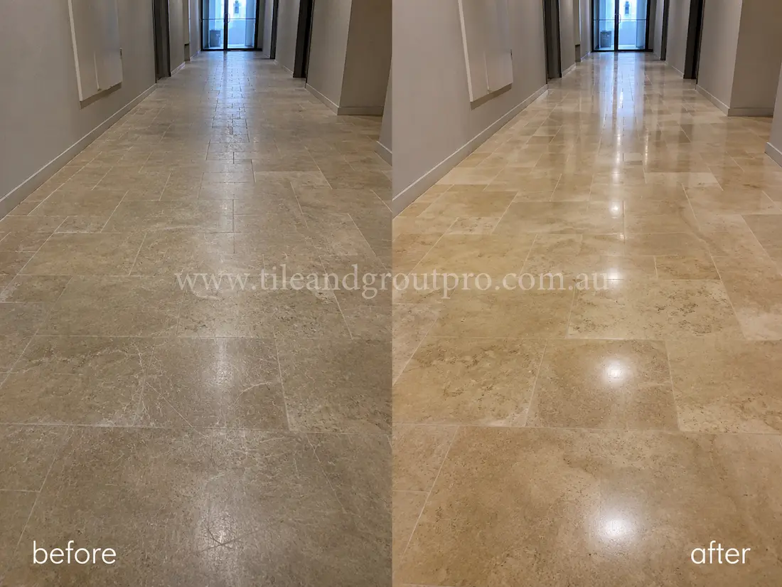 Long hallway with beige travertine floor tiles before and after scratch removal, showing scratched and worn natural stone flooring restored to a glossy polished finish. 