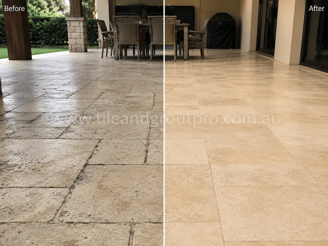 Covered outdoor patio with travertine floor tiles showing weathering, surface dullness, and darkened grout lines before professional tile resurfacing and restoration.
