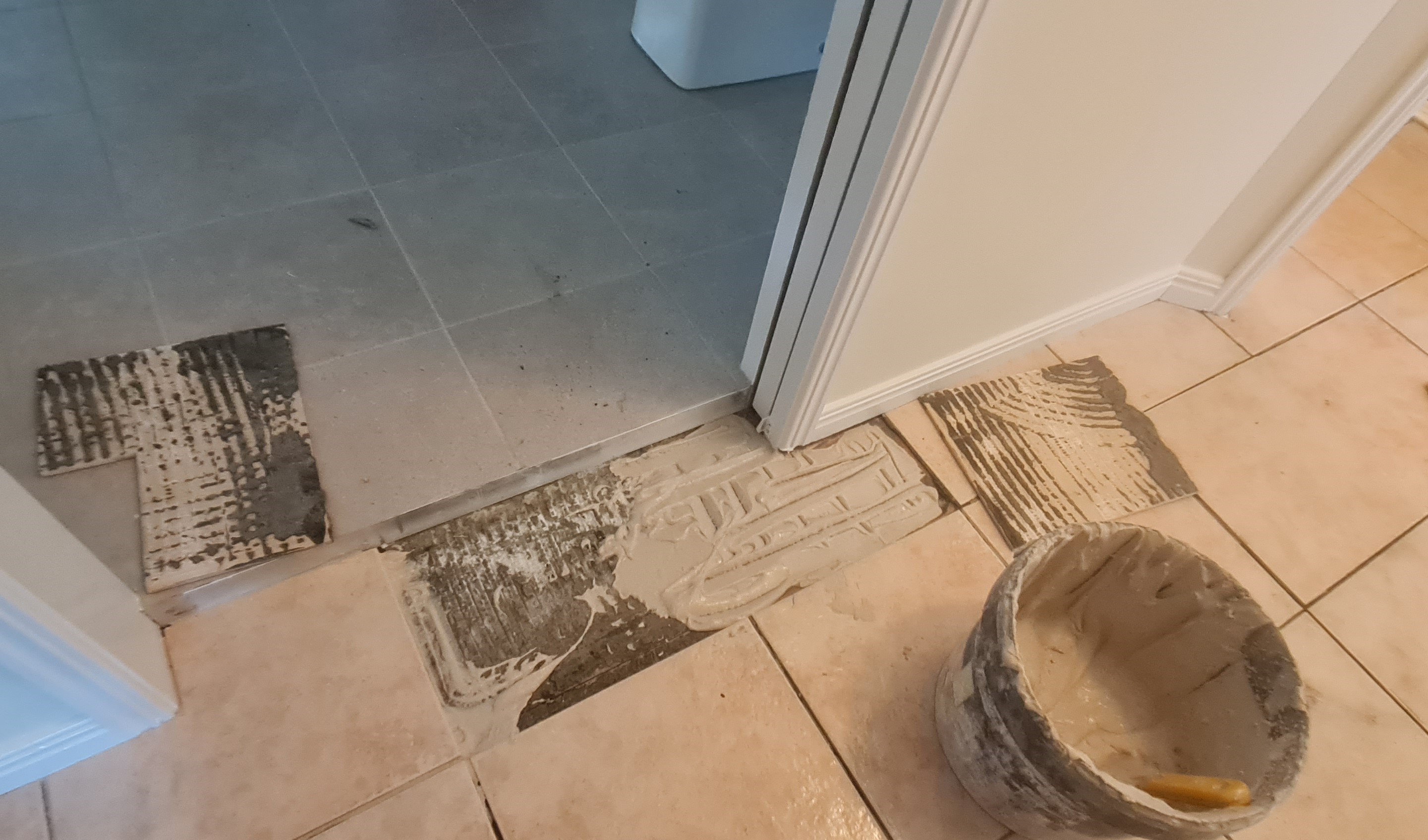 Professional tile replacement on damaged tile floor in Bunbury